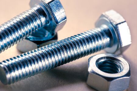 Screw bolts and nuts in closeup newの写真素材