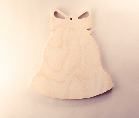 Blank wooden cutting board in bell formの写真素材
