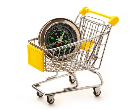 Market pushcart with compass on white background closeupの写真素材