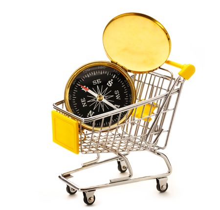 Market pushcart with compass on white background closeupの写真素材