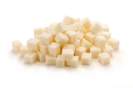 Cubes of sugar on the white backgroundの写真素材