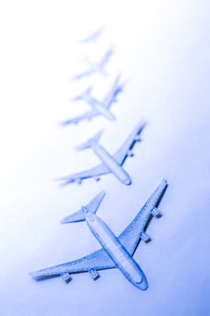 Set of small paper airplanes in blueの写真素材
