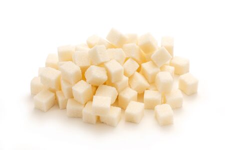 Cubes of sugar on the white backgroundの写真素材