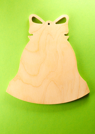 Blank wooden cutting board in bell formの写真素材