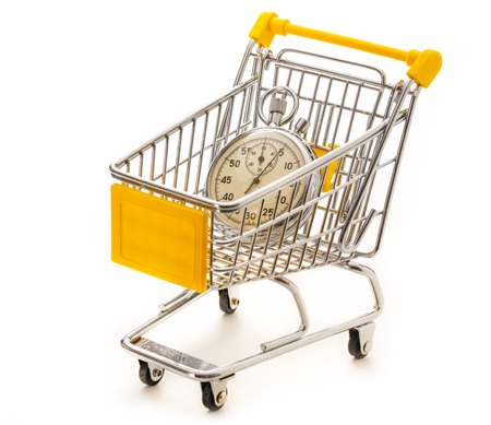Stopwatch in the small supermarket pushcart closeupの写真素材