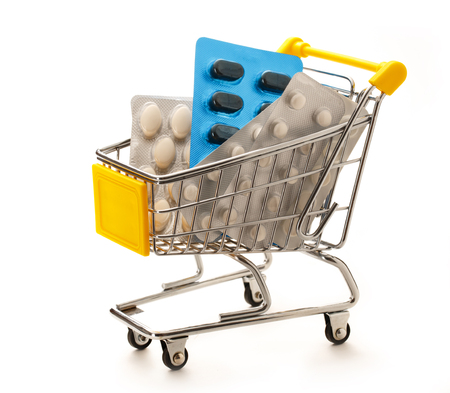 Market pushcart with packs of pills in closeupの写真素材