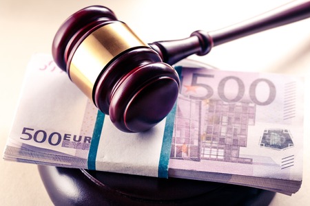 Wooden judge's gavel and euro in toningの写真素材