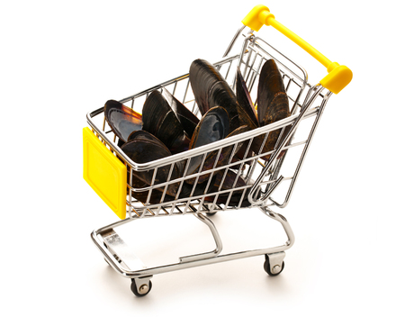Market pushcart with sea mussels in closeupの写真素材
