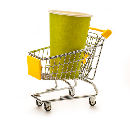 Green paper cups in small supermarket pushcartの写真素材