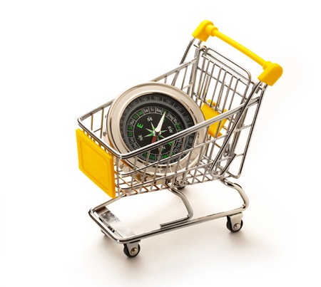 Market pushcart with compass on white background closeupの写真素材