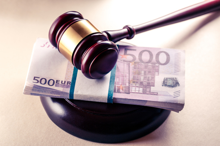Wooden judge's gavel and euro in toningの写真素材