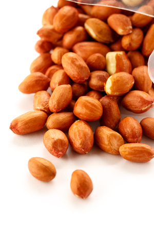 Pile of fresh dried peanuts in closeupの写真素材