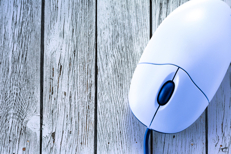 Computer mouse in the blue toning closeupの写真素材