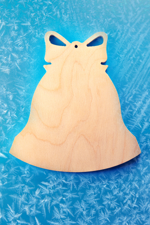Blank wooden cutting board in bell formの写真素材