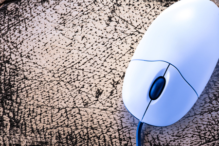 Computer mouse in the blue toning closeupの写真素材