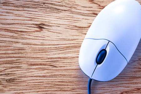 Computer mouse in the blue toning closeupの写真素材