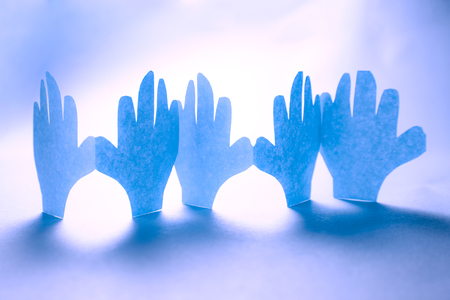Paper hands in connection as friendship symbolの写真素材