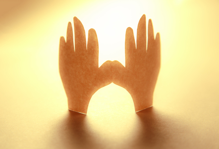 Paper hands in connection as friendship symbolの写真素材