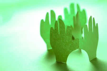 Paper hands in connection as friendship symbolの写真素材