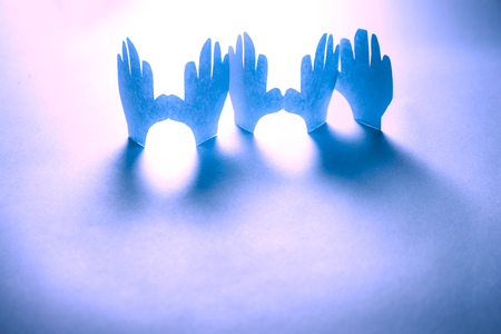 Paper hands in connection as friendship symbolの写真素材