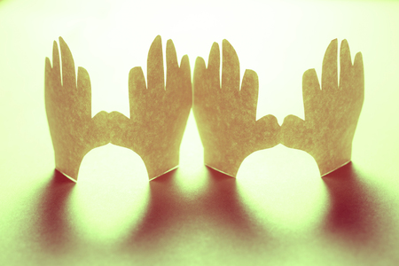 Paper hands in connection as friendship symbolの写真素材