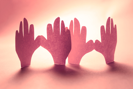 Paper hands in connection as friendship symbolの写真素材