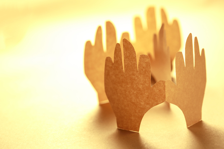 Paper hands in connection as friendship symbolの写真素材