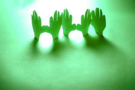 Paper hands in connection as friendship symbolの写真素材
