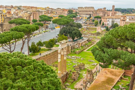 Scenic shot of Rome with Colosseum and Roman Forum, Italy.