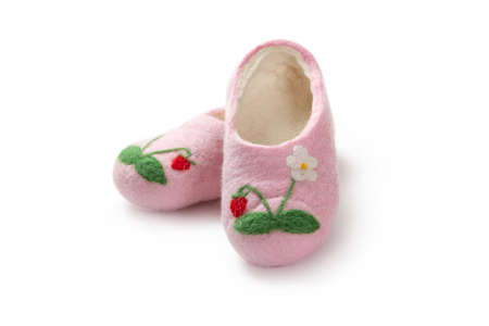 Felt slippers on white background in closeupの写真素材