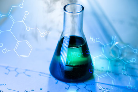 Chemical tube with reaction formula in lightの写真素材