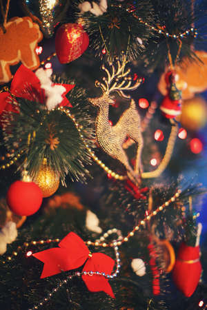 Gold deer on a Christmas tree close upの写真素材