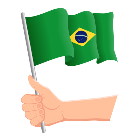 Hand holding and waving the national flag of Brazil. Fans, independence day, patriotic concept. Vector illustration, eps 10.のイラスト素材