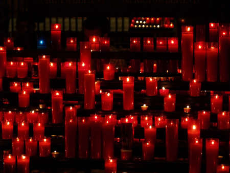 red candles in a churchの写真素材