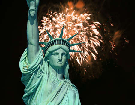 The Statue of Liberty and July 4th Fireworkの写真素材