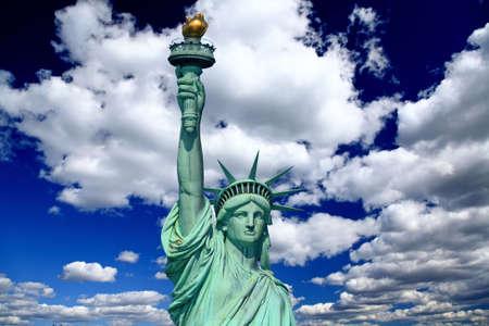 The statue of Liberty under sunny skyの写真素材