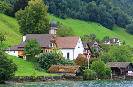 The small village on the hills around Lake Luzern in Switzerland  の写真素材