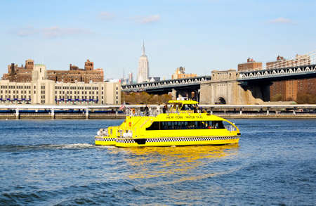 The NYC water taxi in East Riverの写真素材