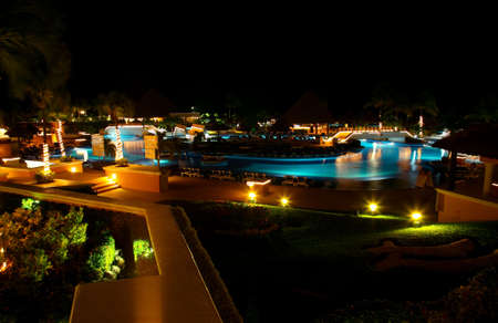 a luxury all inclusive beach resort at night in Cancun Mexicoのeditorial素材