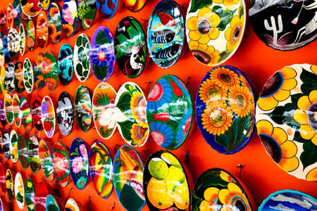 Mexican decoration plates in a Mayan souvenir shopの写真素材