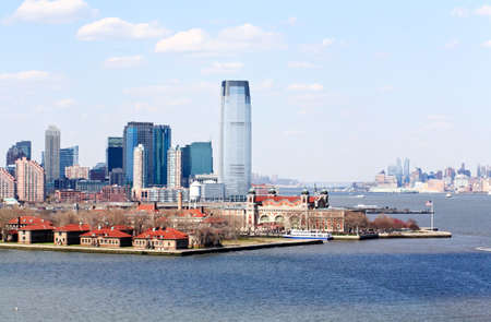The Ellis Island and the office buildings in New Jerseyの写真素材