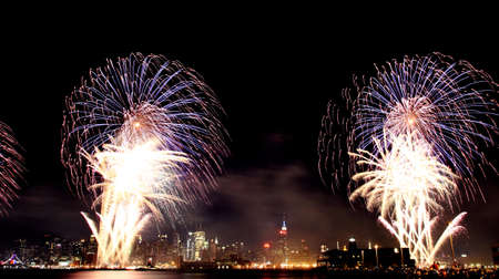 The 4th of July fireworks over the Hudson River west of Midtown Manhattanの写真素材