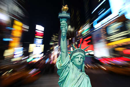 The statue of Liberty and times square in the New York City の写真素材