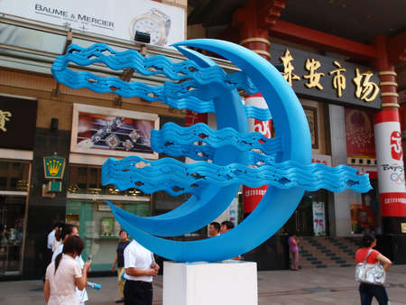 2008 Beijing summer sports competition game national artistic city sculpture competition finalists displayed for public voting in the major shopping district Wanf-Fu-Jing in Beijing July 2006. The winning sculptures will be built at different sports competition sites/parks around city.のeditorial素材