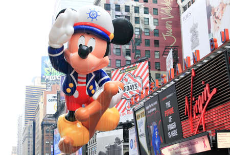 MANHATTAN - NOVEMBER 26 : A Sailor Mickey Mouse balloon passing Times Square at the Macy's Thanksgiving Day Parade November 26, 2009 in Manhattan.のeditorial素材