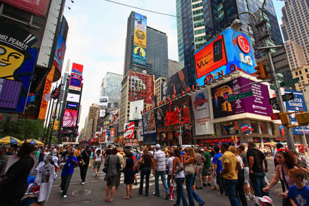 The famous Times Square at Mid-town Manhattan - a wide angle viewのeditorial素材
