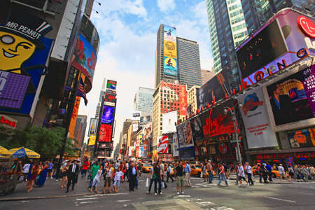 The famous Times Square at Mid-town Manhattan - a wide angle viewのeditorial素材