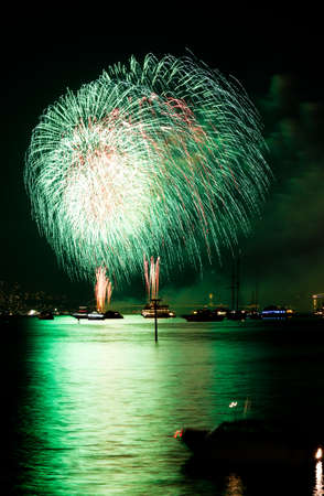 NEW YORK - JULY 4: the Macy's 4th of July fireworks displays on July 4, 2010 over Hudson Riverの写真素材