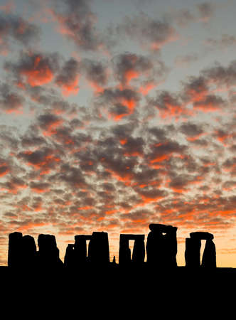 The silhouette of Stonehenge in UK under sunrise backgroundの写真素材