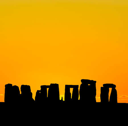 The silhouette of Stonehenge in UK under sunrise backgroundの写真素材